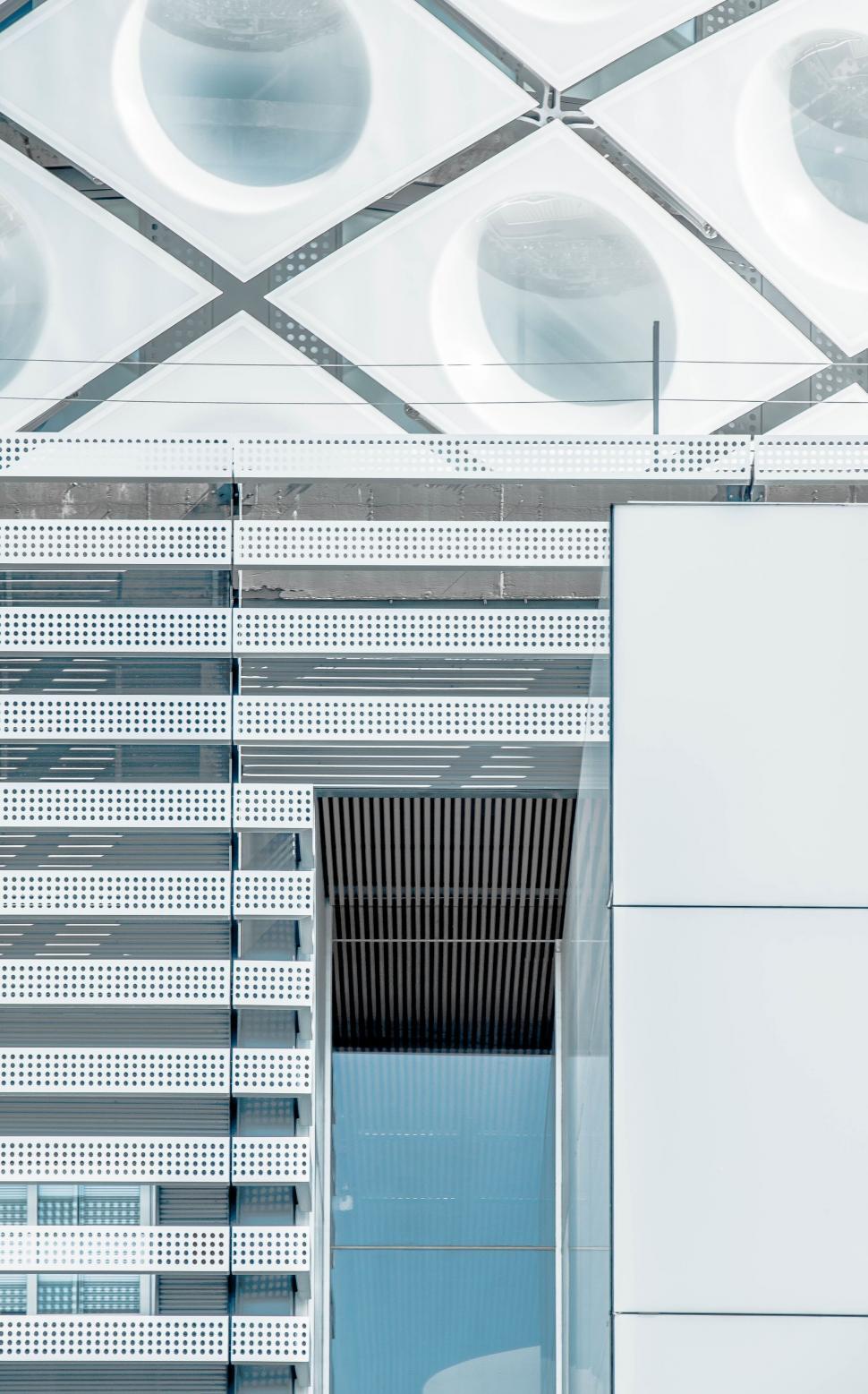 Free Image of Close-up of modern building facade with metal panels. 