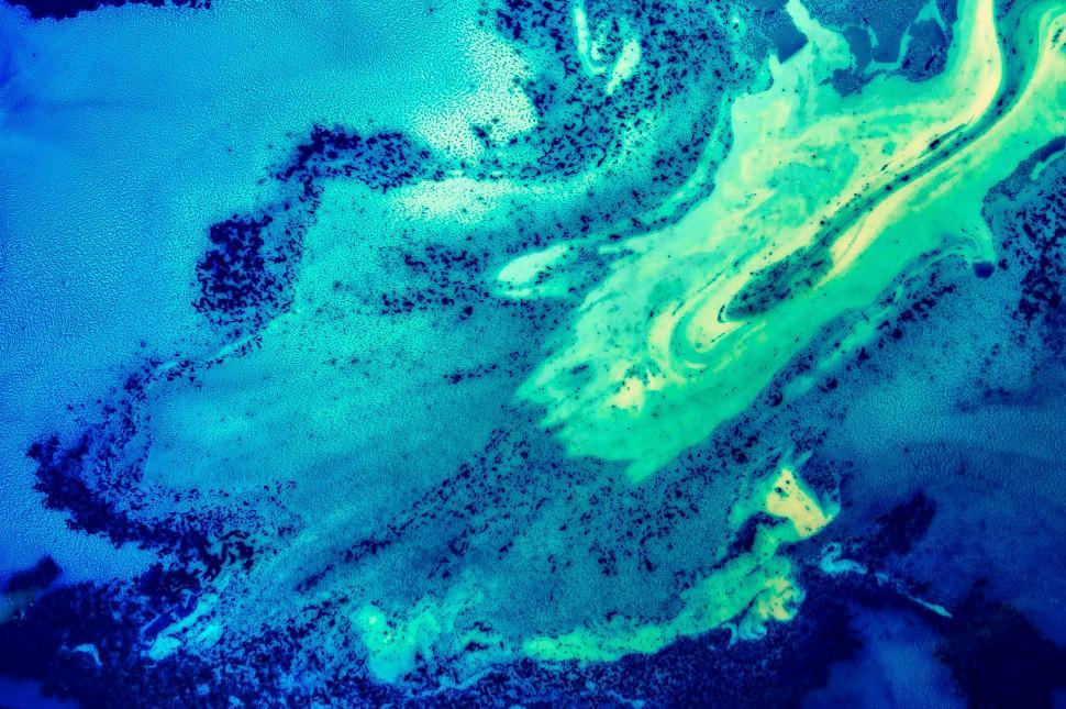 Free Image of Abstract art with swirling blue and green colors, and texture 