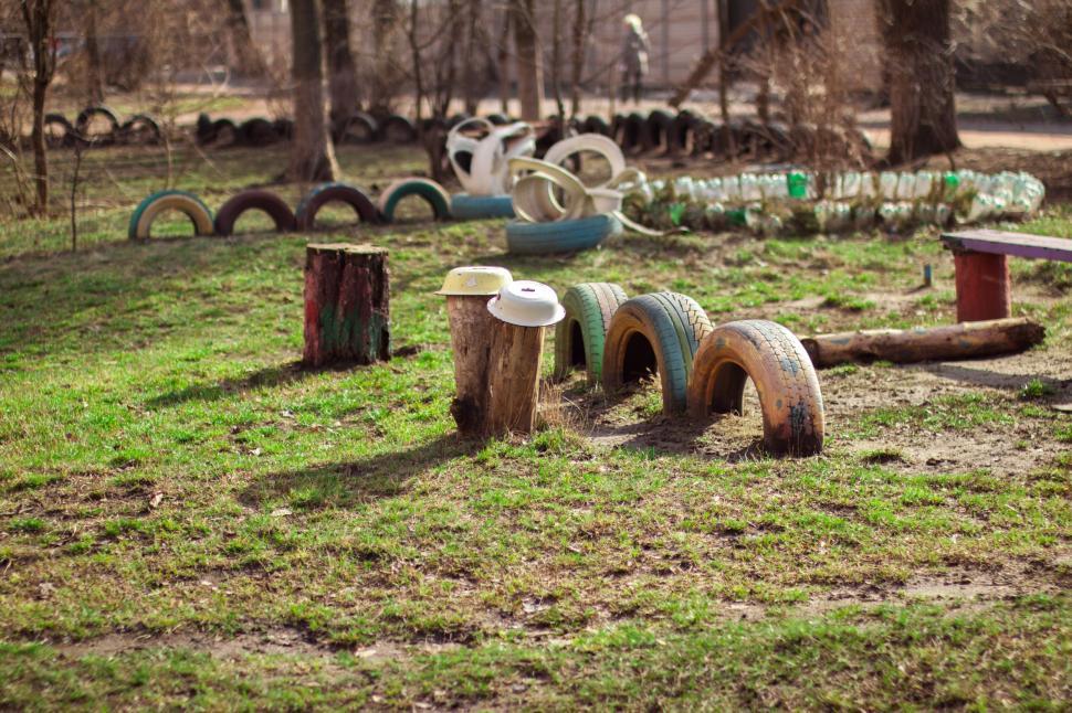 Free Image of Playground with recycled tire set up for children playing. 