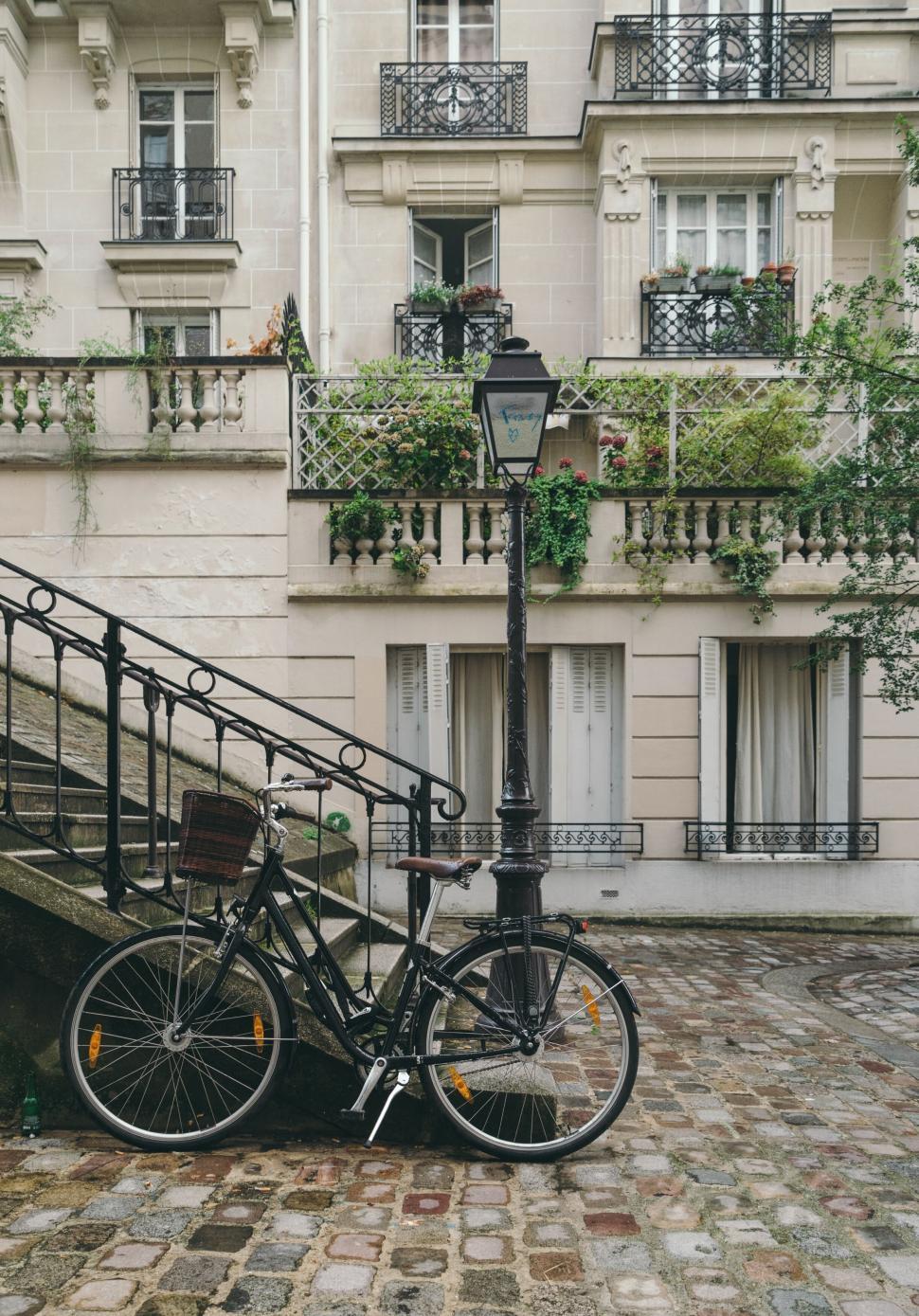 Free Image of Corner of cobblestone street with vintage bicycle, Europe. 