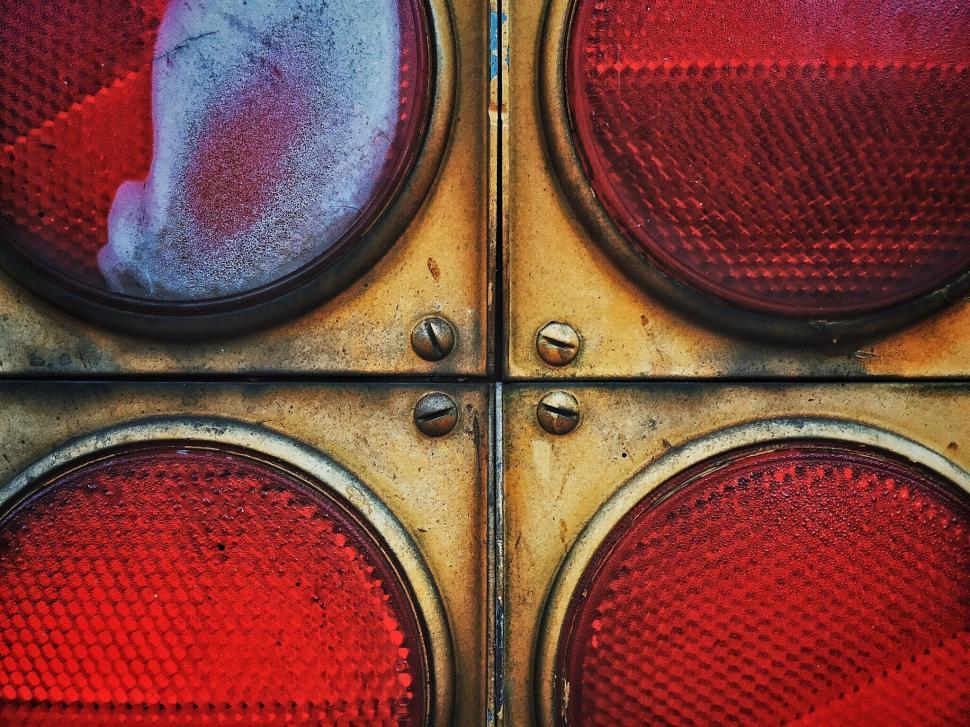 Free Image of Close-up of four red retro traffic lights with pattern 