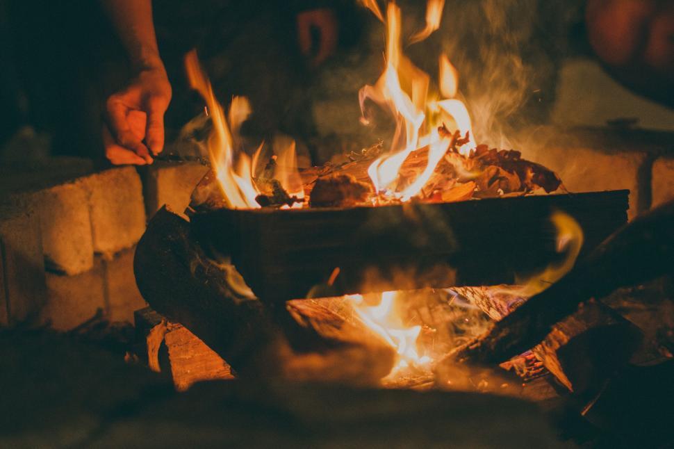 Free Image of Close-up of a campfire with logs burning intensely 