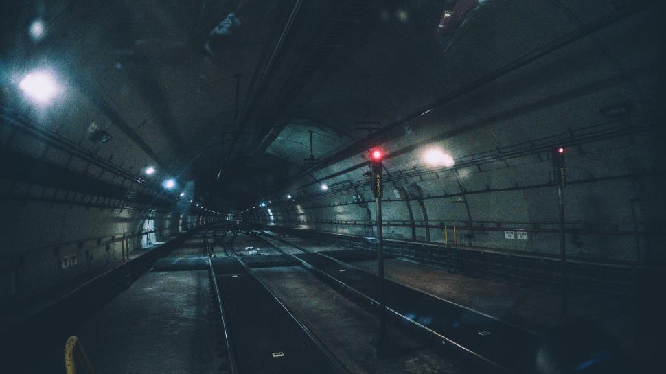 https://freerangestock.com/sample/176153/dimly-lit-subway-tunnel-with-illuminated-tracks-and-signals..jpg