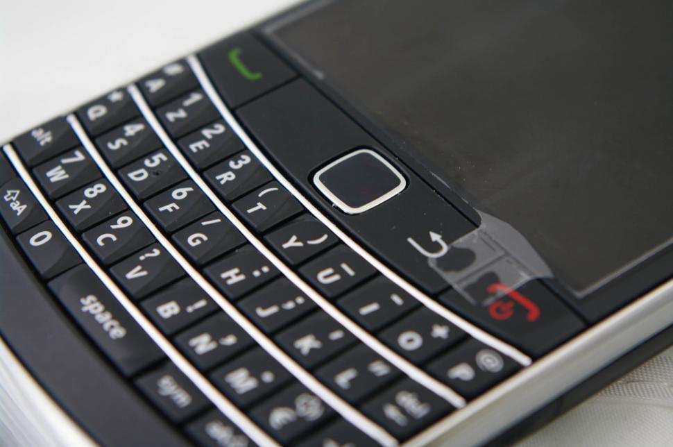 Free Image of Close Up of a Cell Phone on a Table 