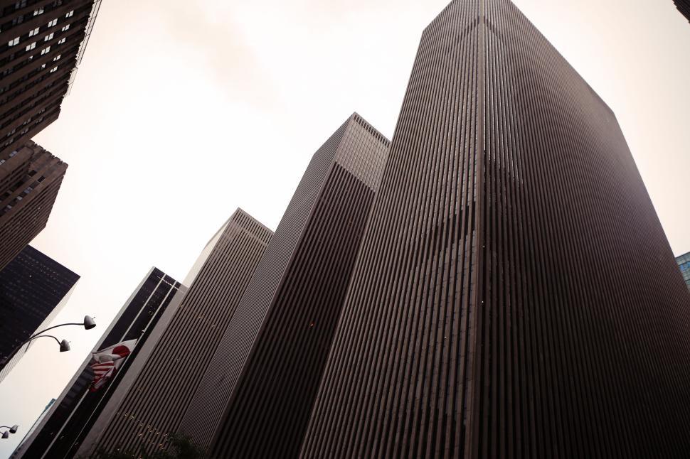 Free Image of Tall skyscrapers reaching towards the sky in urban cityscape 