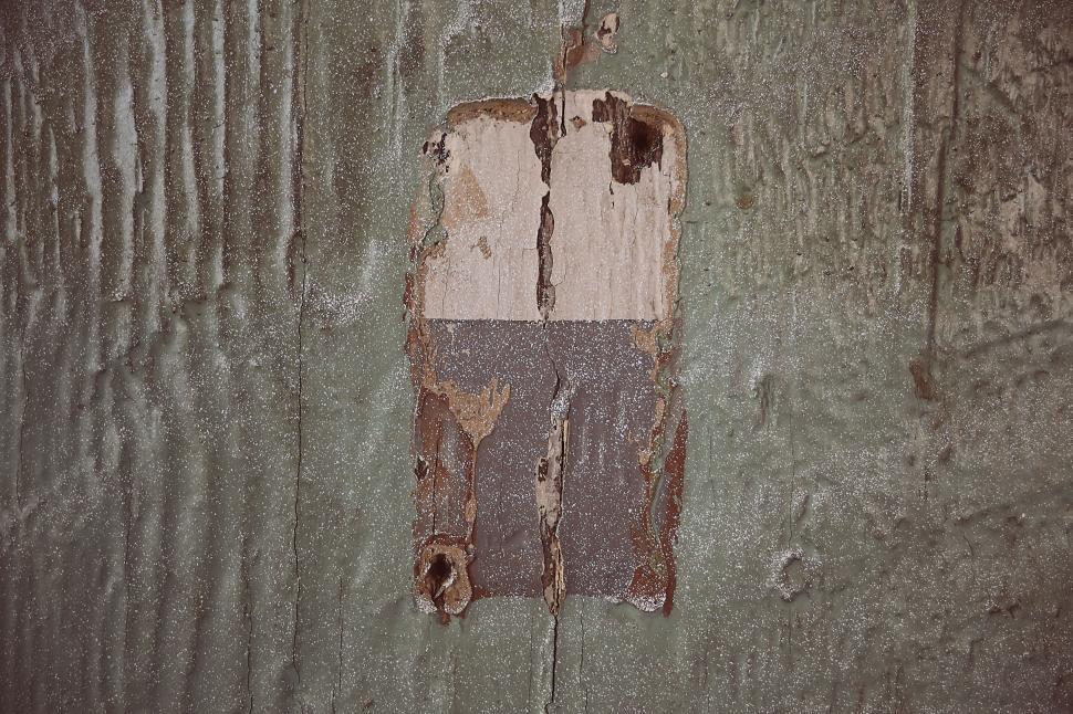 Free Image of Weathered wall with peeling paint revealing layers for vintage look 
