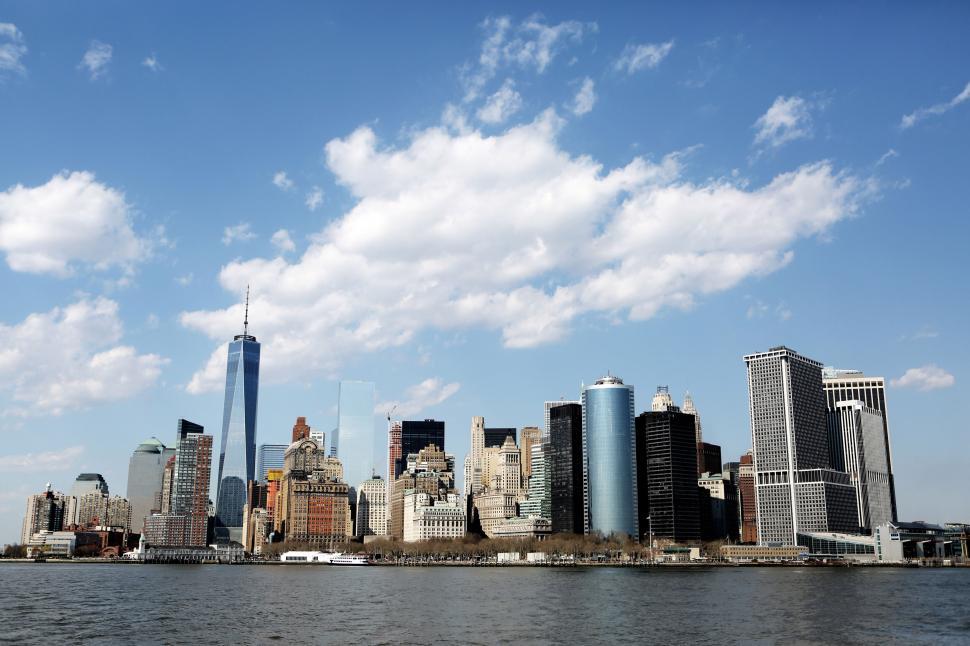 Free Image of Skyline of modern city buildings under a clear blue sky 