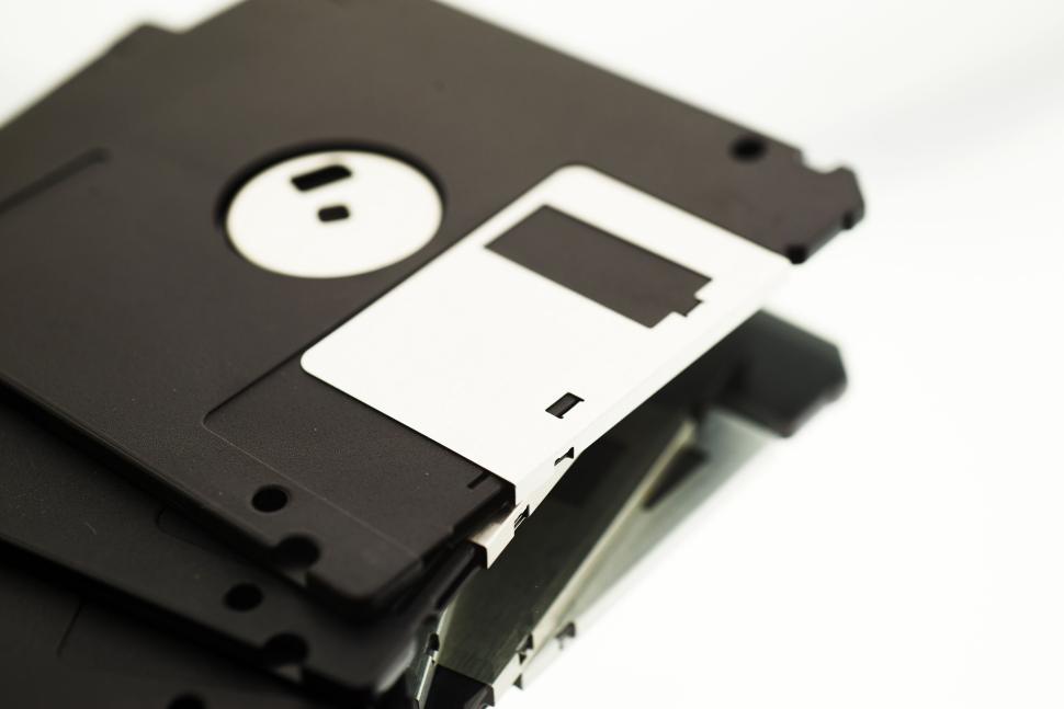 Free Image of Stack of black floppy disks with a white label, close-up view 