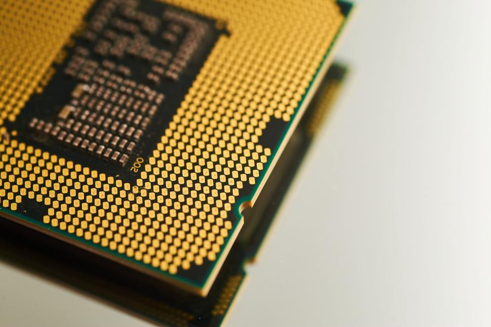 Free Stock Photo of Close-up of a CPU showing gold pins and intricate ...