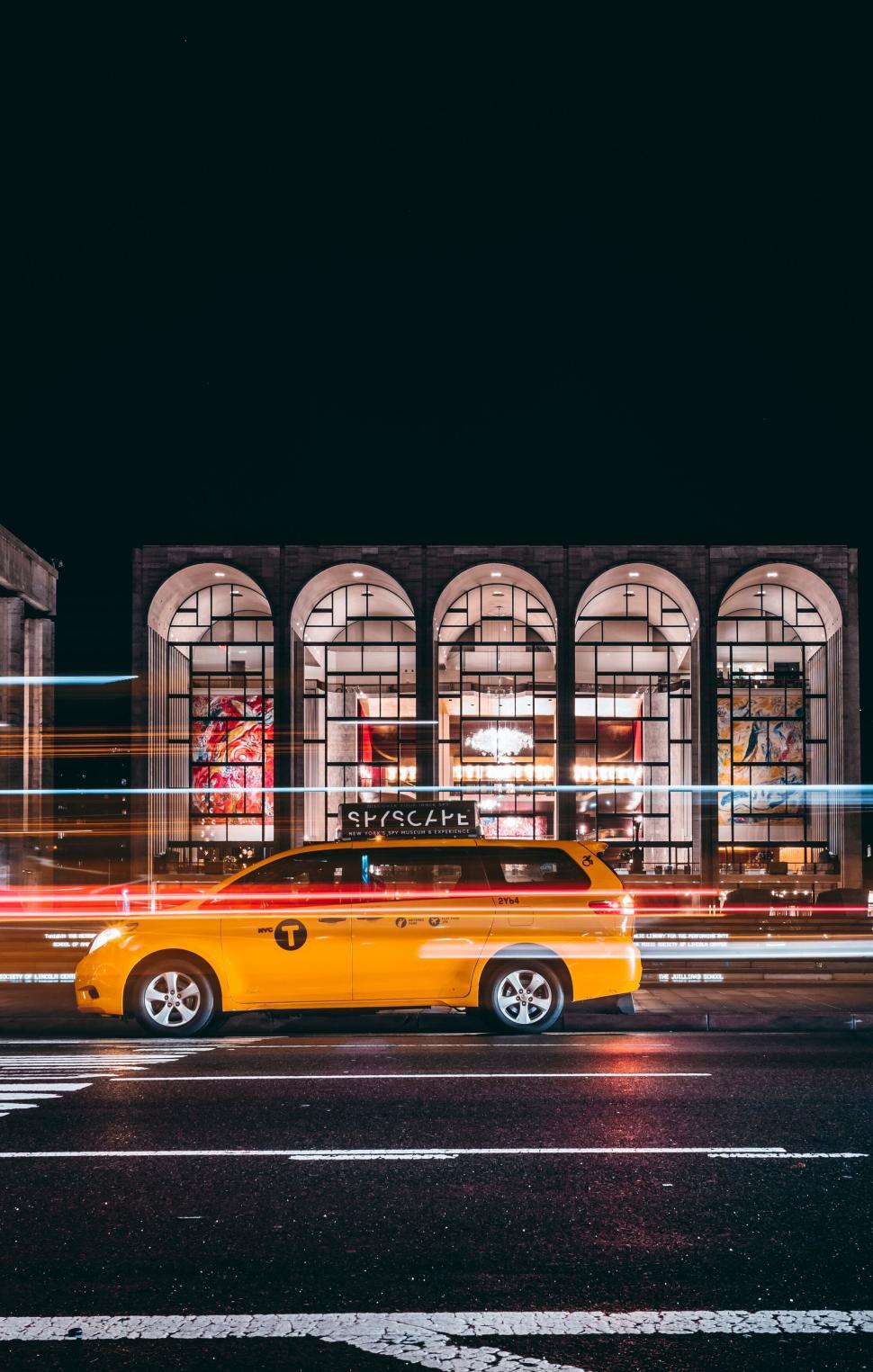 Free Stock Photo of Yellow taxi driving at night with colorful city ...