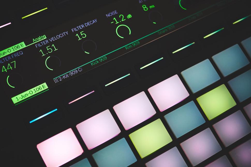 Free Image of Close-up of a music production controller with colorful pads 