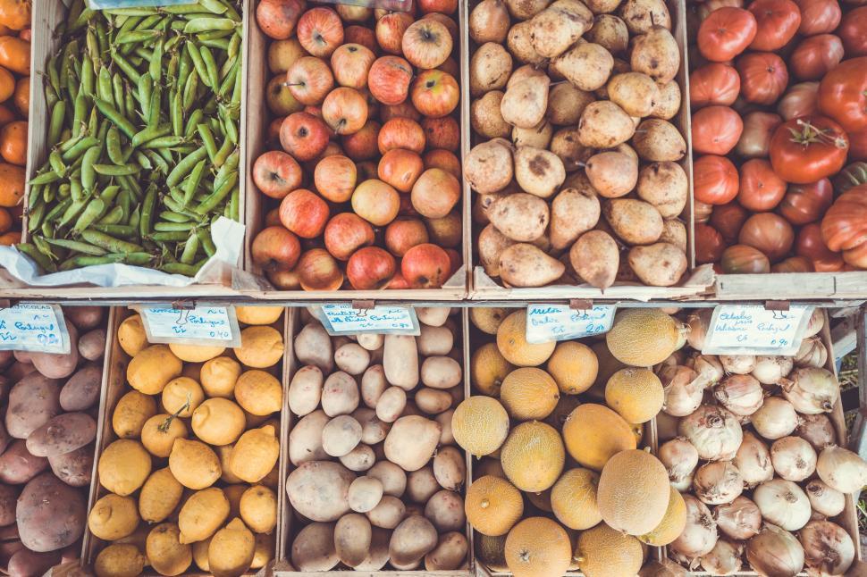 Free Image of A variety of fresh fruits and vegetables displayed at the market 