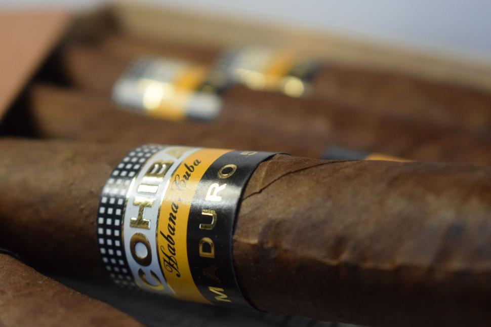 Free Image of Cuban Cohiba Maduro cigars neatly displayed in a wooden box 