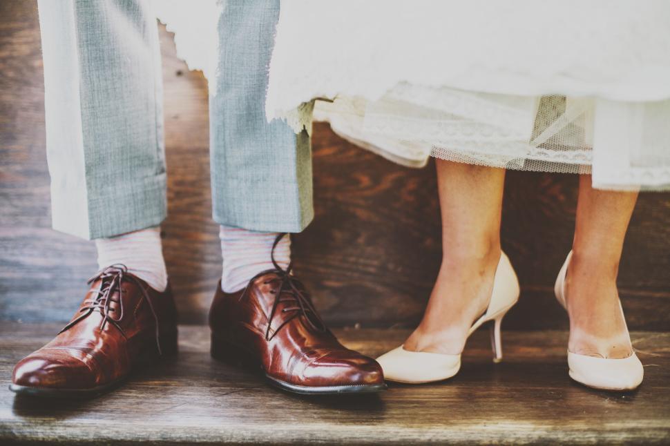 Free Image of Bride and groom shoes close-up on their wedding day. 