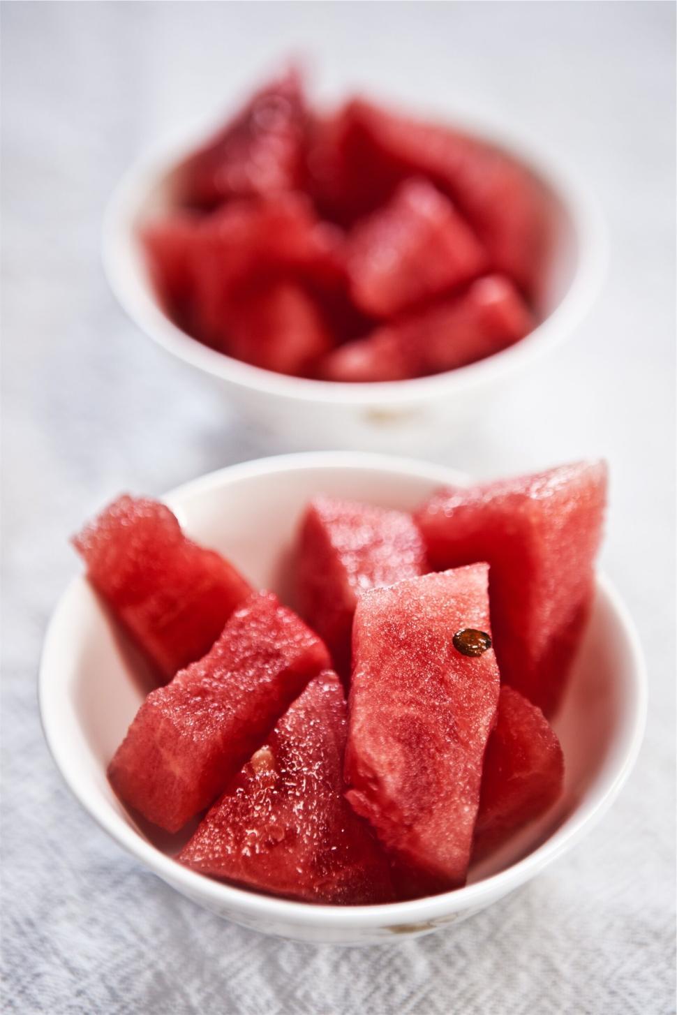 Free Image of Close-up of fresh watermelon pieces in white bowls. 