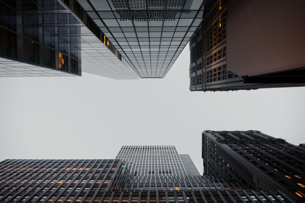 Free Image of Looking up at tall skyscrapers in a modern cityscape 