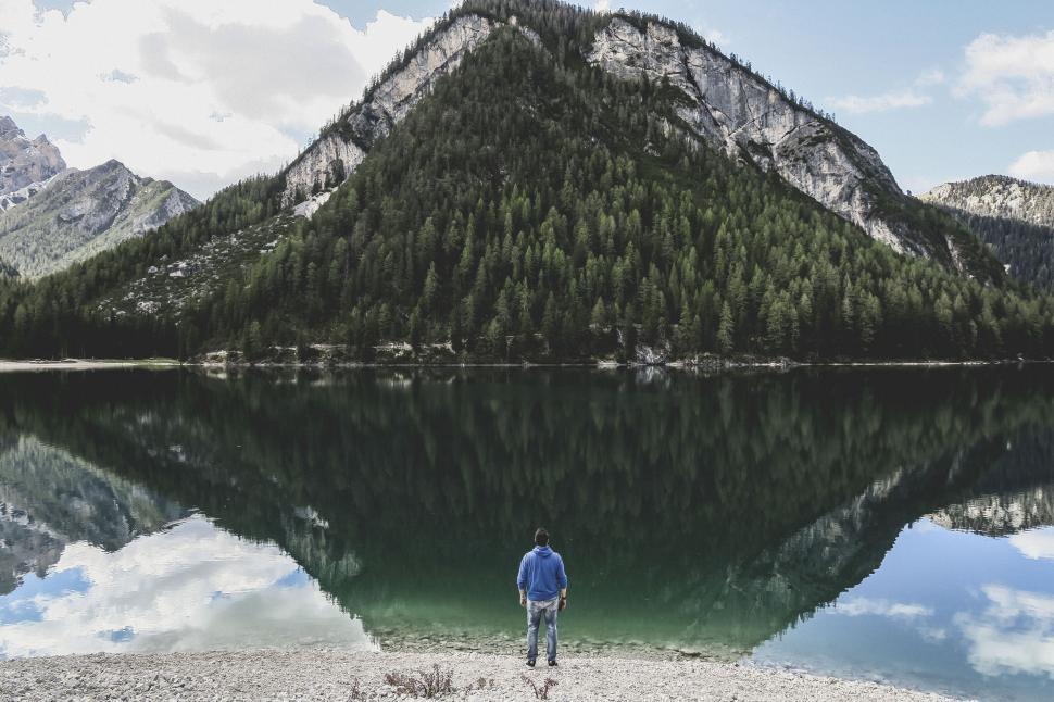 Free Image of Reflection of a mountain in a serene lake scenery. 