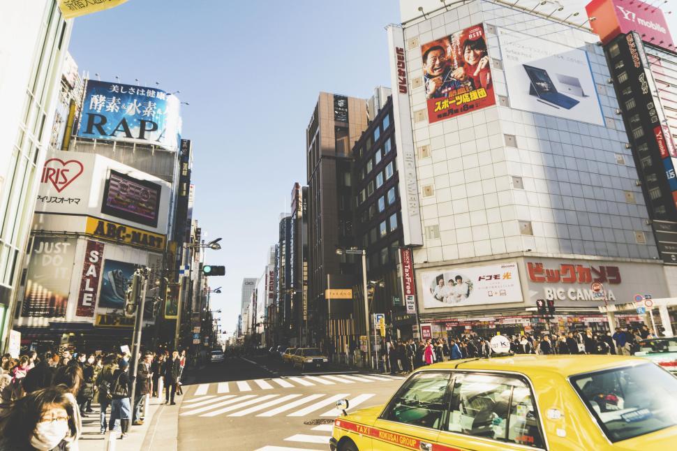 Free Image of Vibrant street in urban city with bright advertisements 