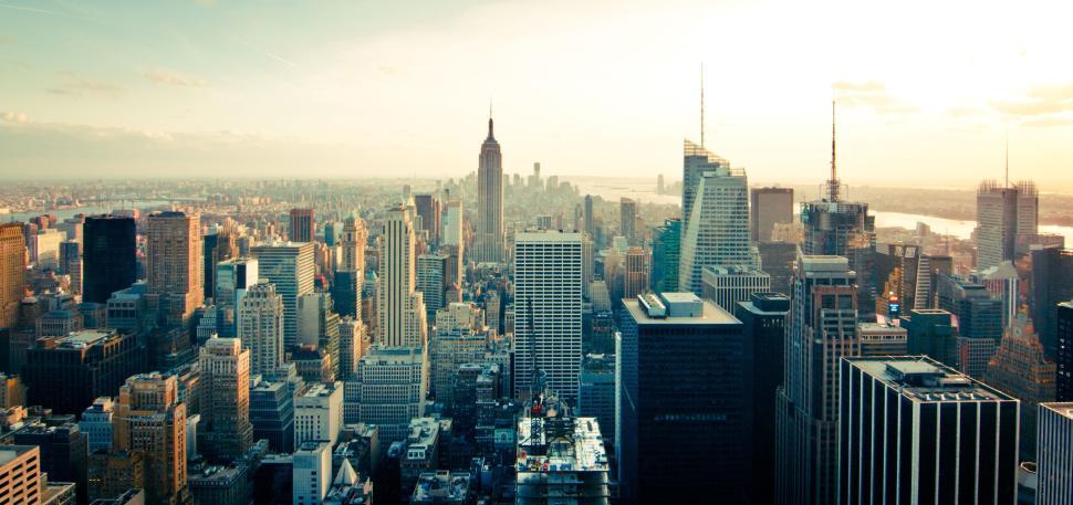 Free Image of Cityscape with towering skyscrapers and famous landmarks 