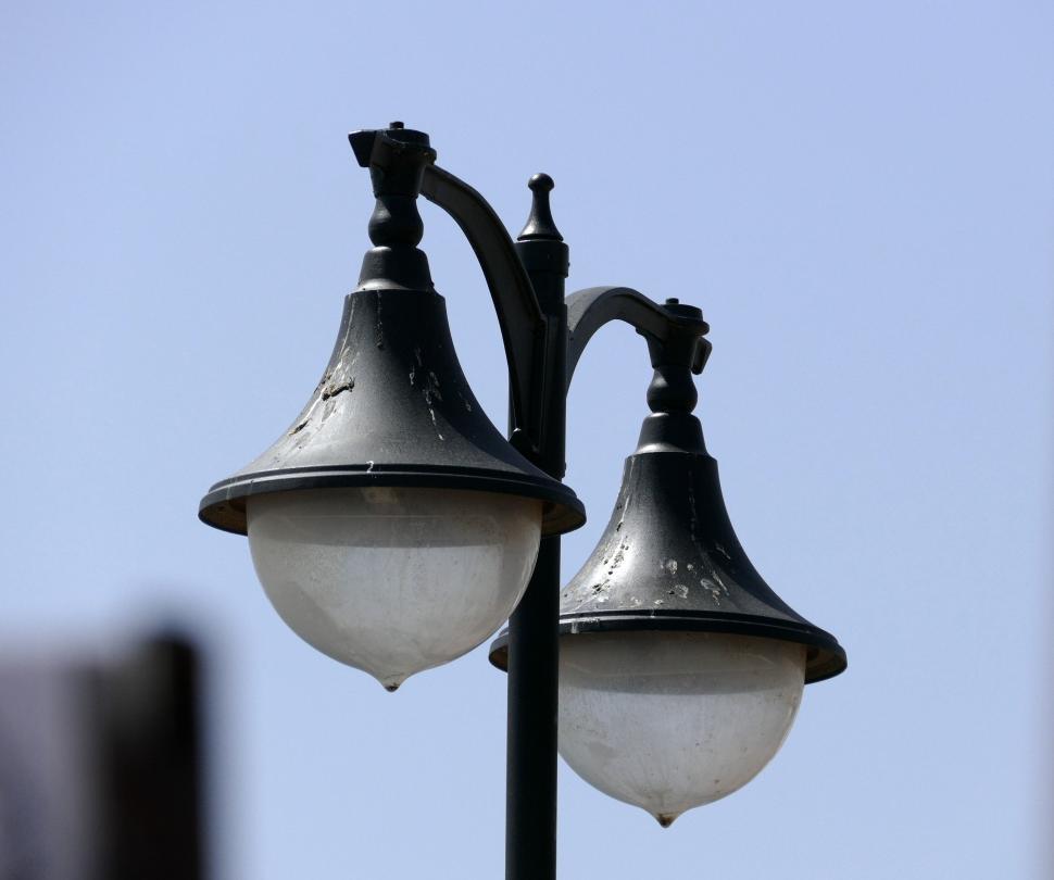 Free Image of Vintage street lamps with a weathered, historical look. 