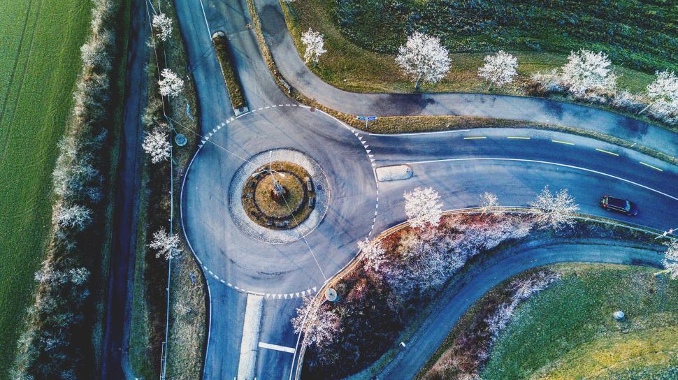 Free Image of Aerial view of a roundabout intersecting country roads 