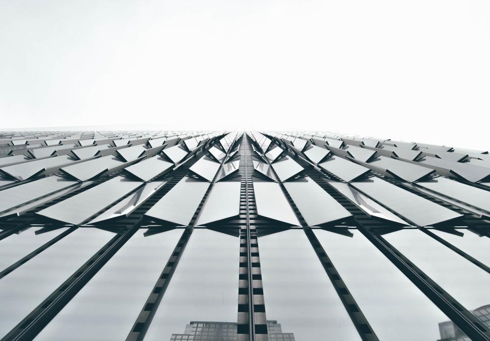 Free Image of Modern skyscraper exterior with repeating geometric patterns. 