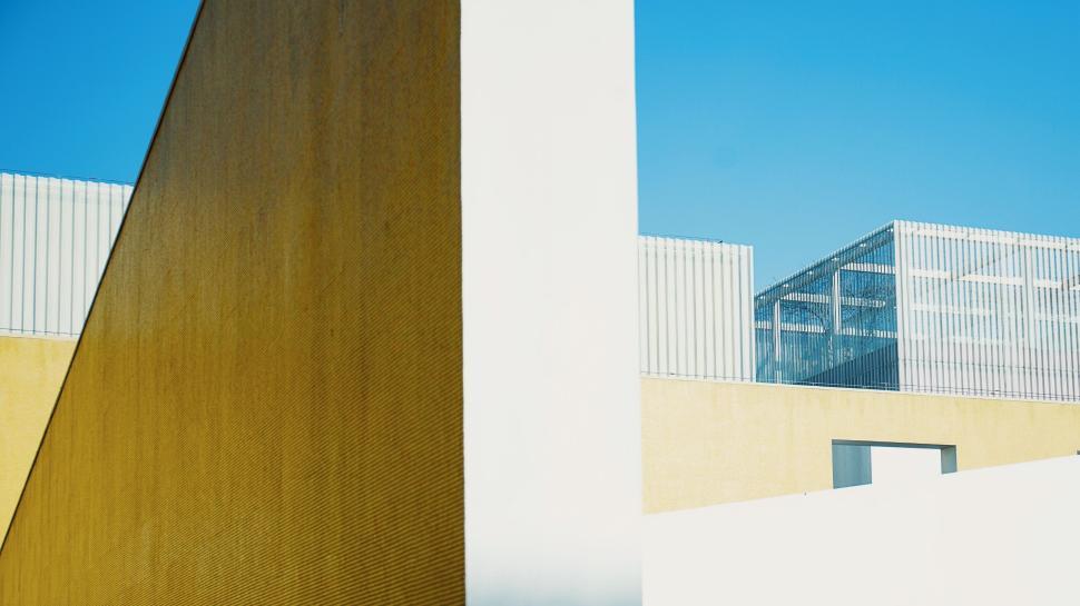 Free Image of Modern architectural buildings with yellow abstract lines. 