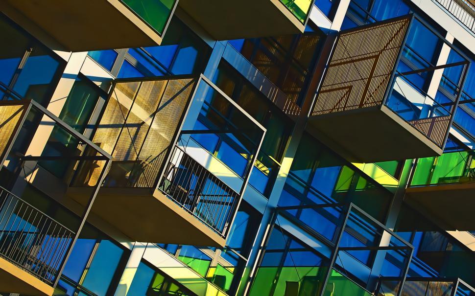Free Image of Modern balconies with colorful reflections and shadows. 