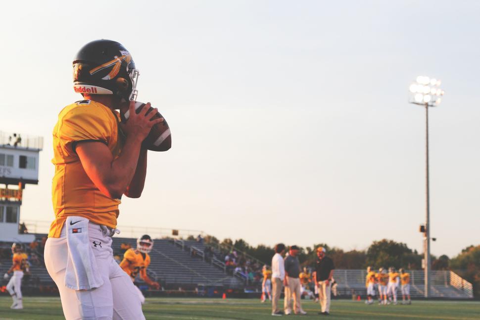 Free Image of Football player getting ready to throw the football 