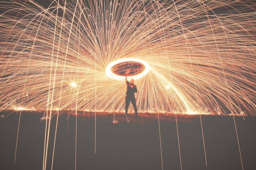 Free Image of Light painting effect creating bright circular patterns 