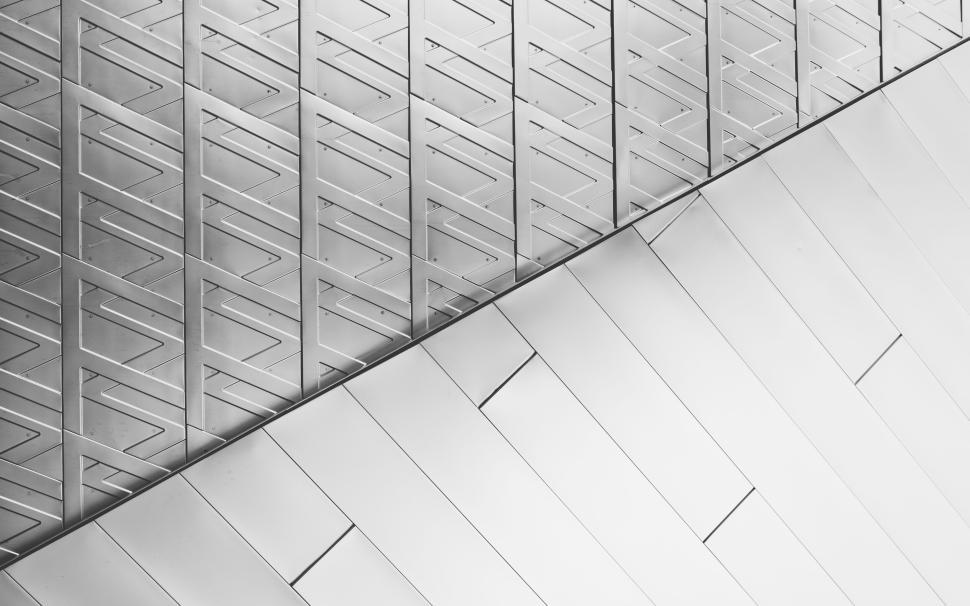 Free Image of Abstract metal wall with geometric pattern design. 