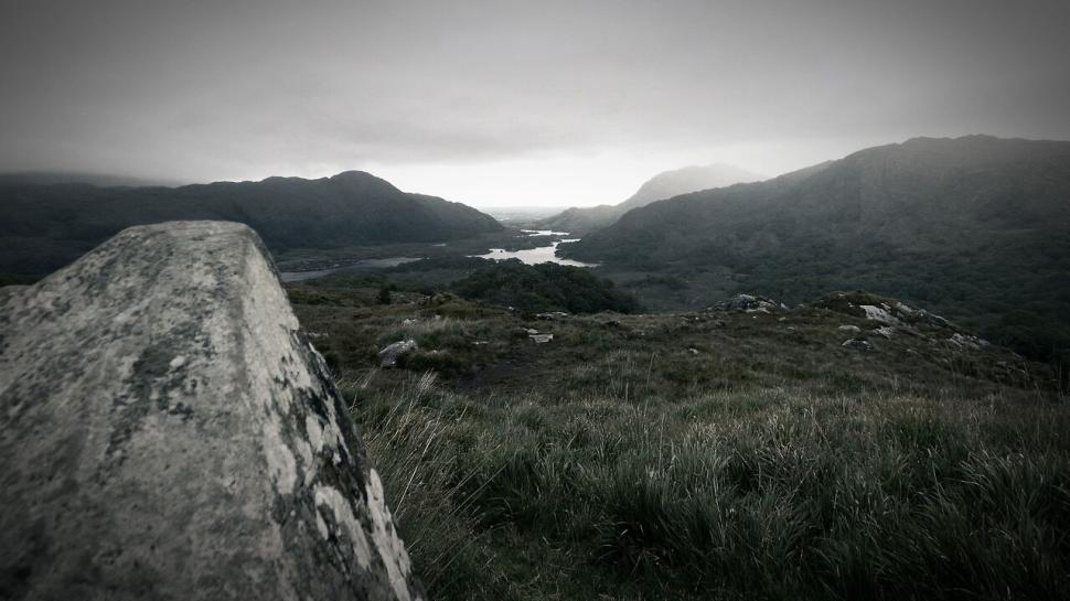 Free Image of Scenic mountain landscape with cloudy sky and lake view 