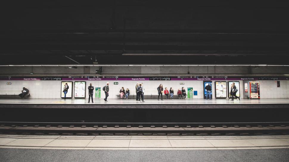 Free Image of People waiting at an underground subway platform station. 