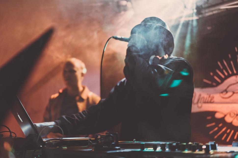 Free Image of DJ Mixing Music on Stage during a Performance 