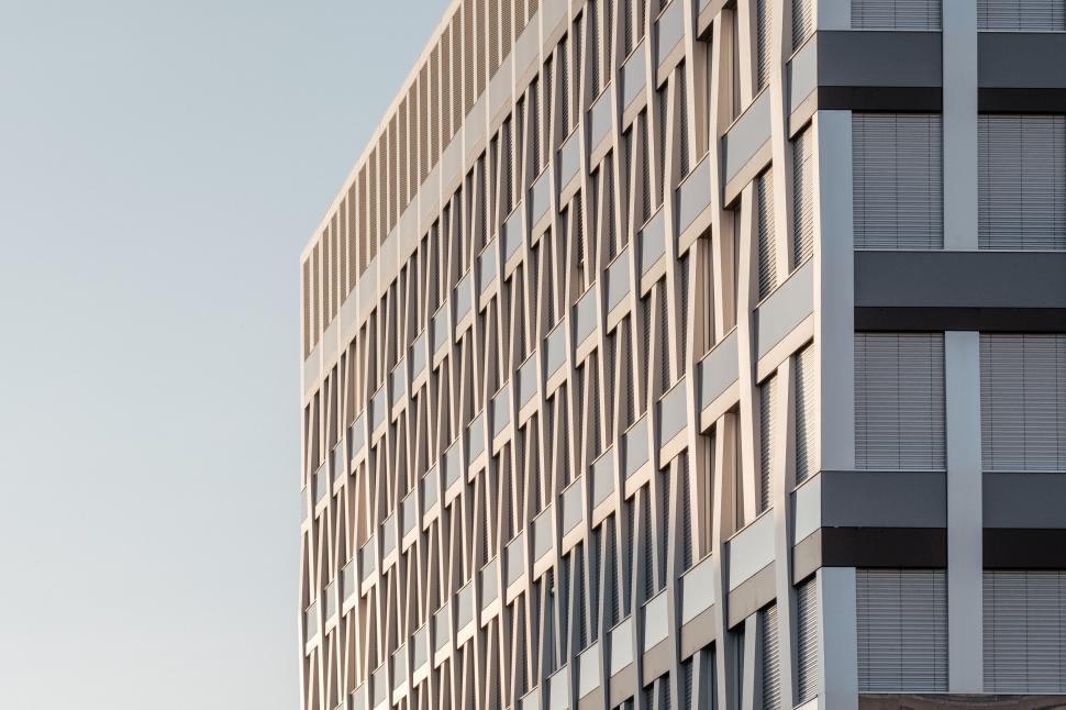 Free Image of Modern building with unique geometric facade design 