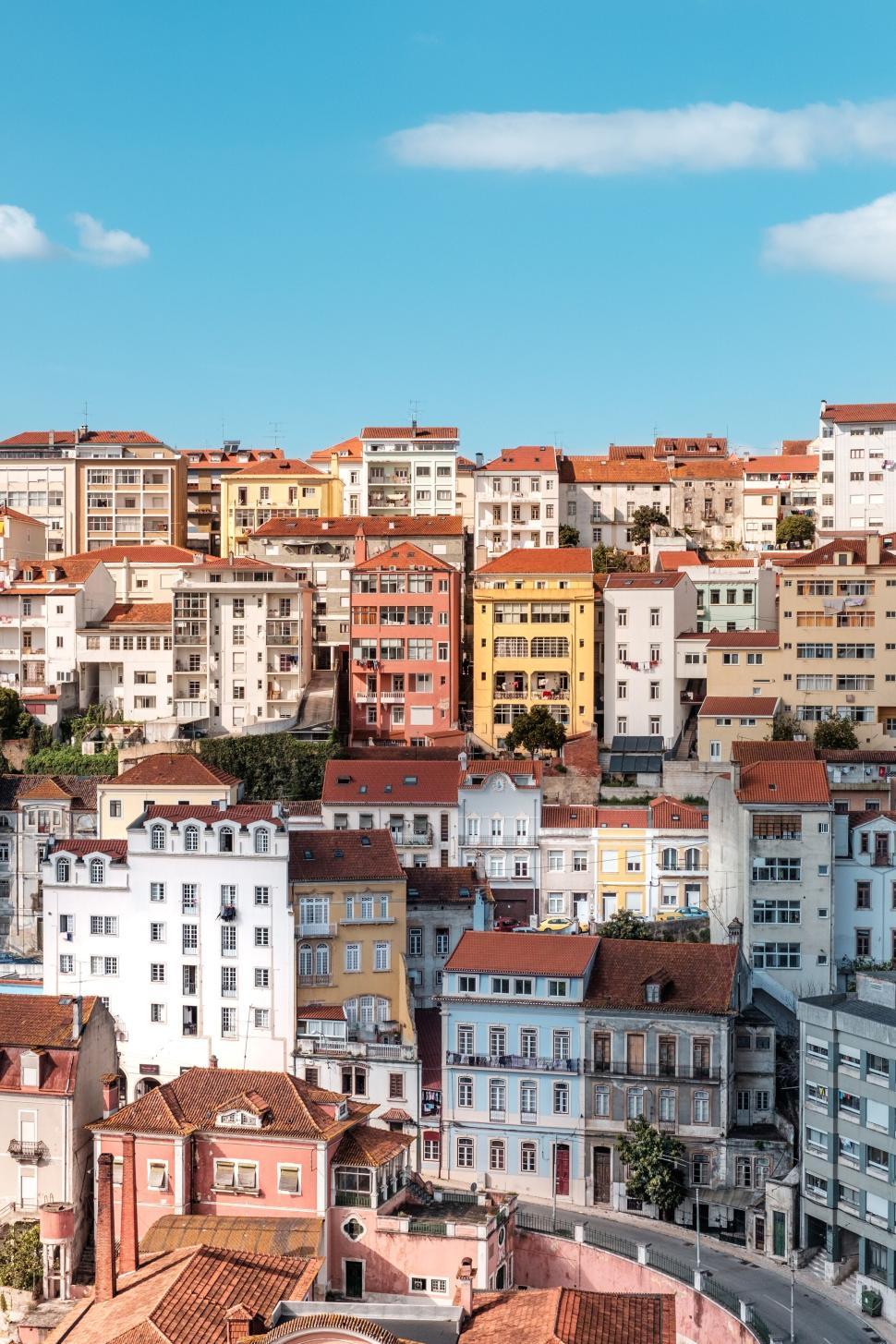 Free Image of Colorful cityscape of residential buildings in sunlight. 
