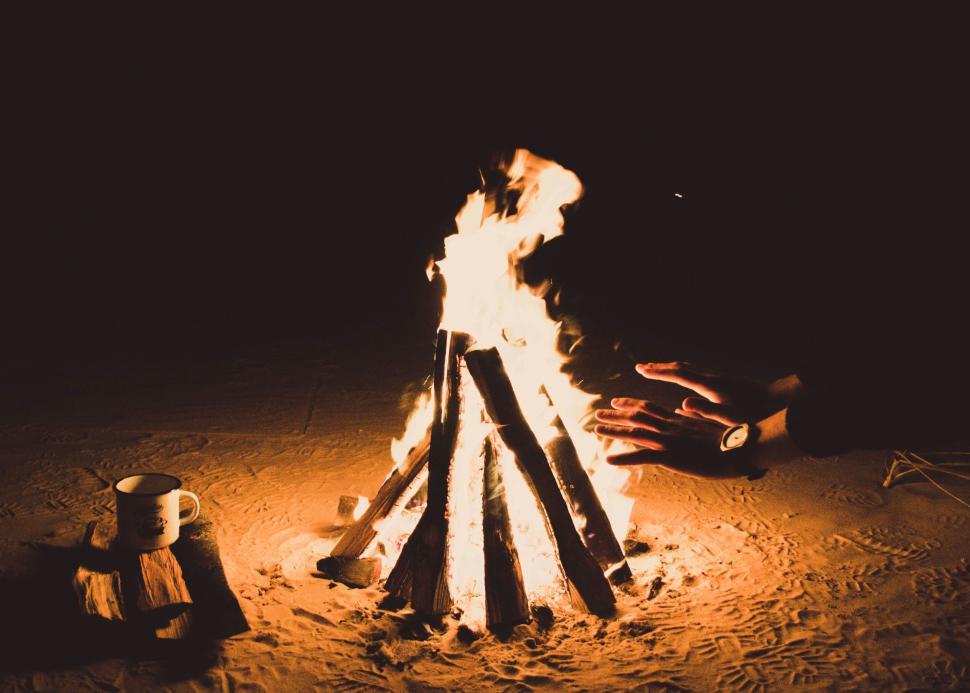 Free Stock Photo of Cozy campfire at night with hands warming by flame ...