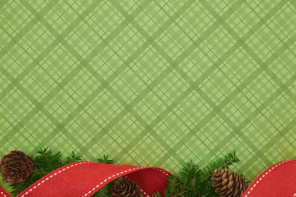 Free Image of Green checkered background with festive elements in corners 