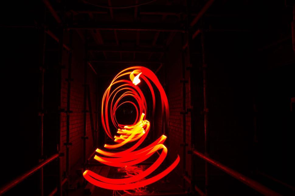 Free Image of Abstract light painting inside an industrial tunnel. 