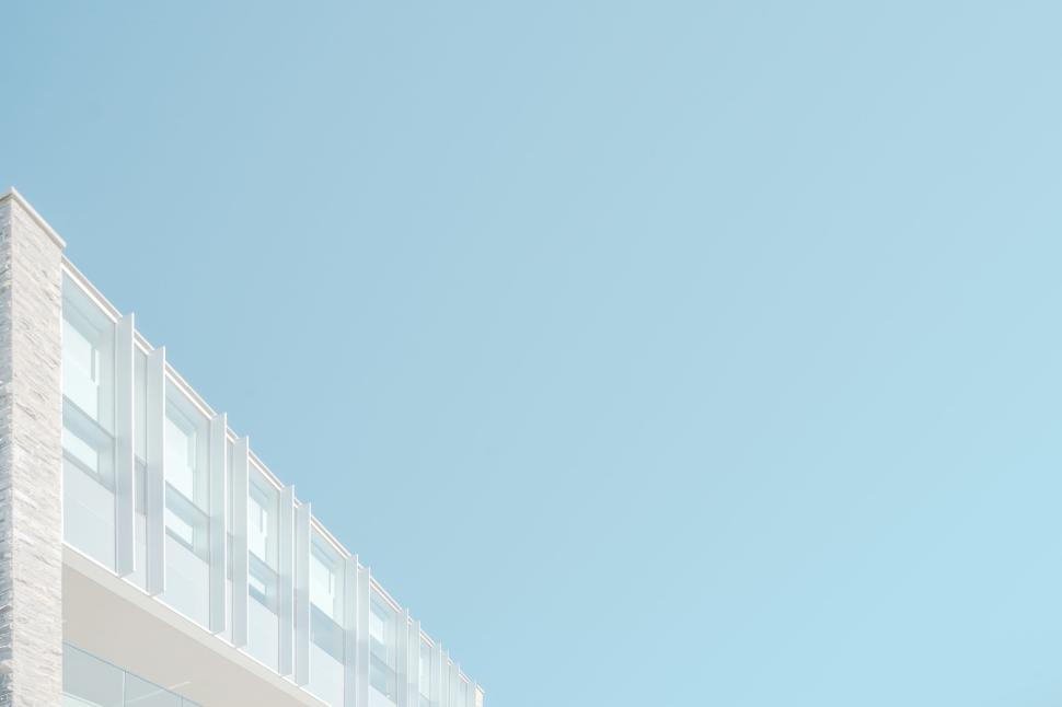Free Image of Modern glass building and clear sky, minimalistic style. 