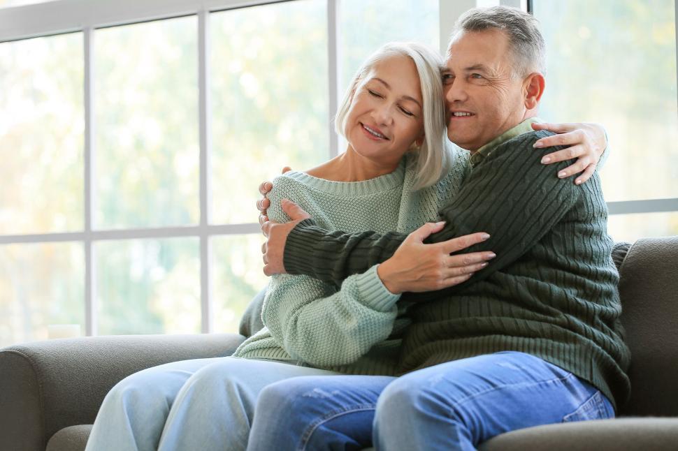 Free Image of Sweet embrace between a loving couple at home 