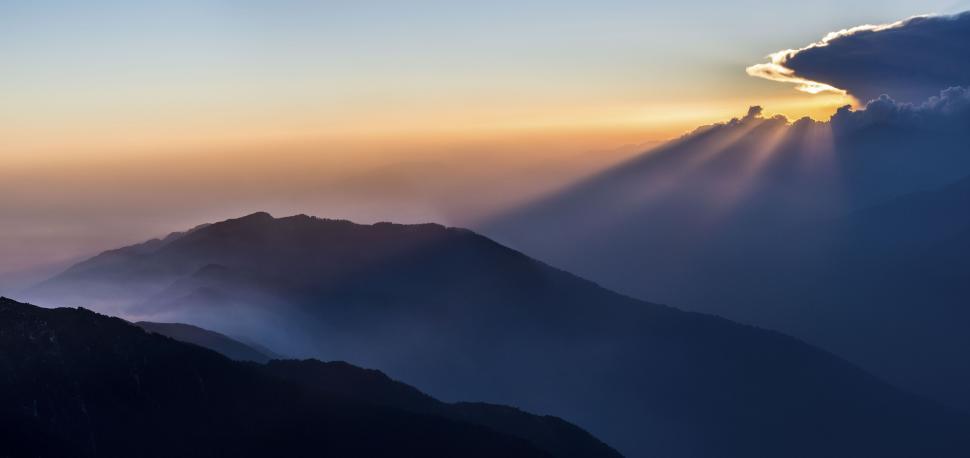 Free Stock Photo of Sunset over mountainous landscape with dramatic ...