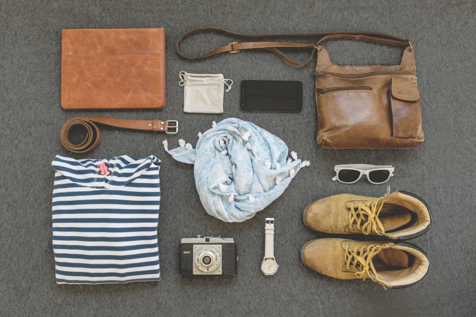Free Image of Flat lay of fashion essentials on carpet, stylish and modern. 