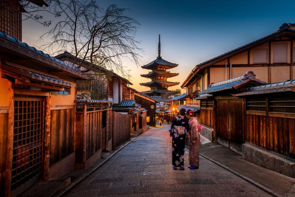 Free Image of Pagoda and traditional street in Kyoto at sunset time. 