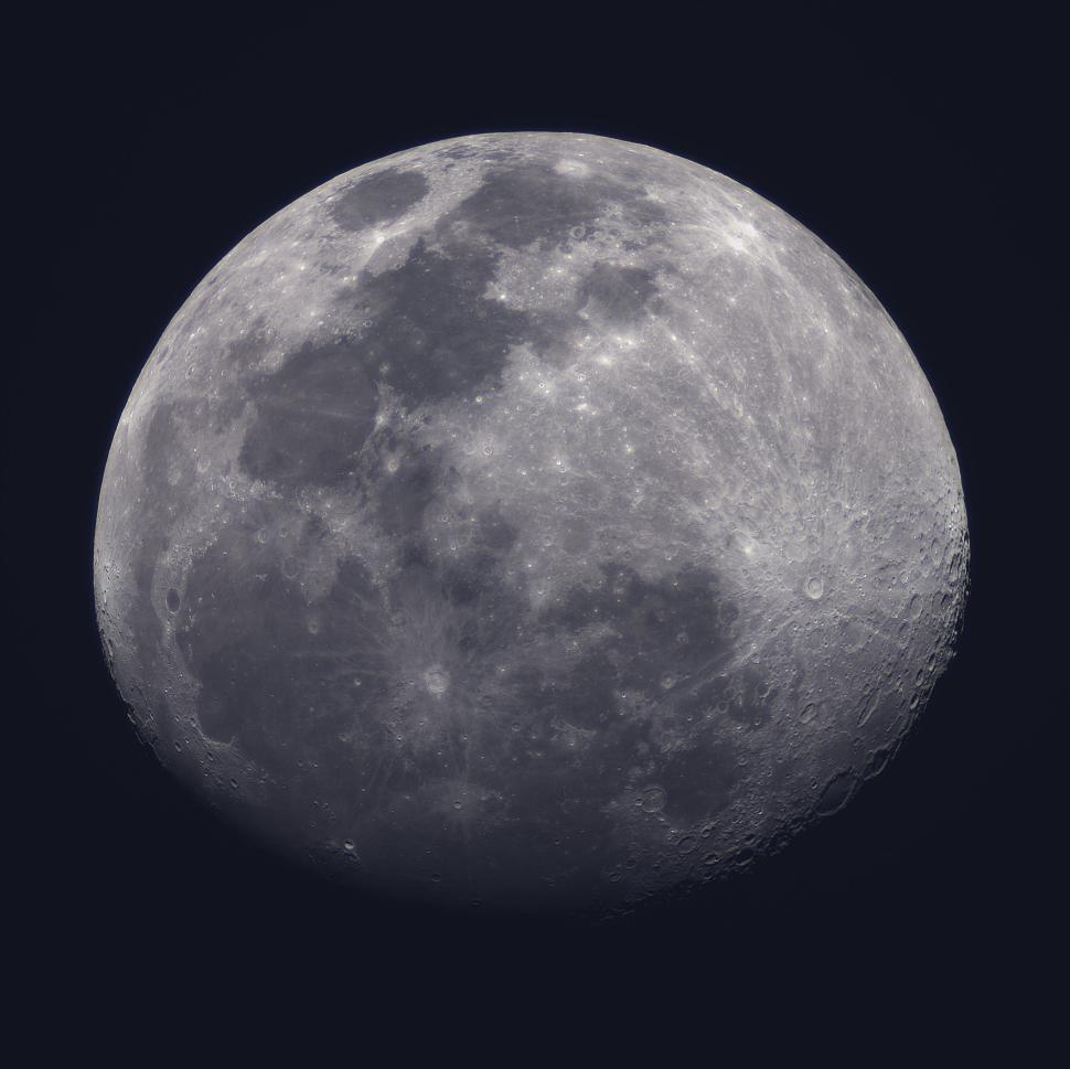 Free Image of Detailed view of a gibbous moon against dark sky 
