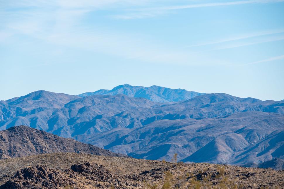Free Image of Mountain range under clear blue sky in daytime 