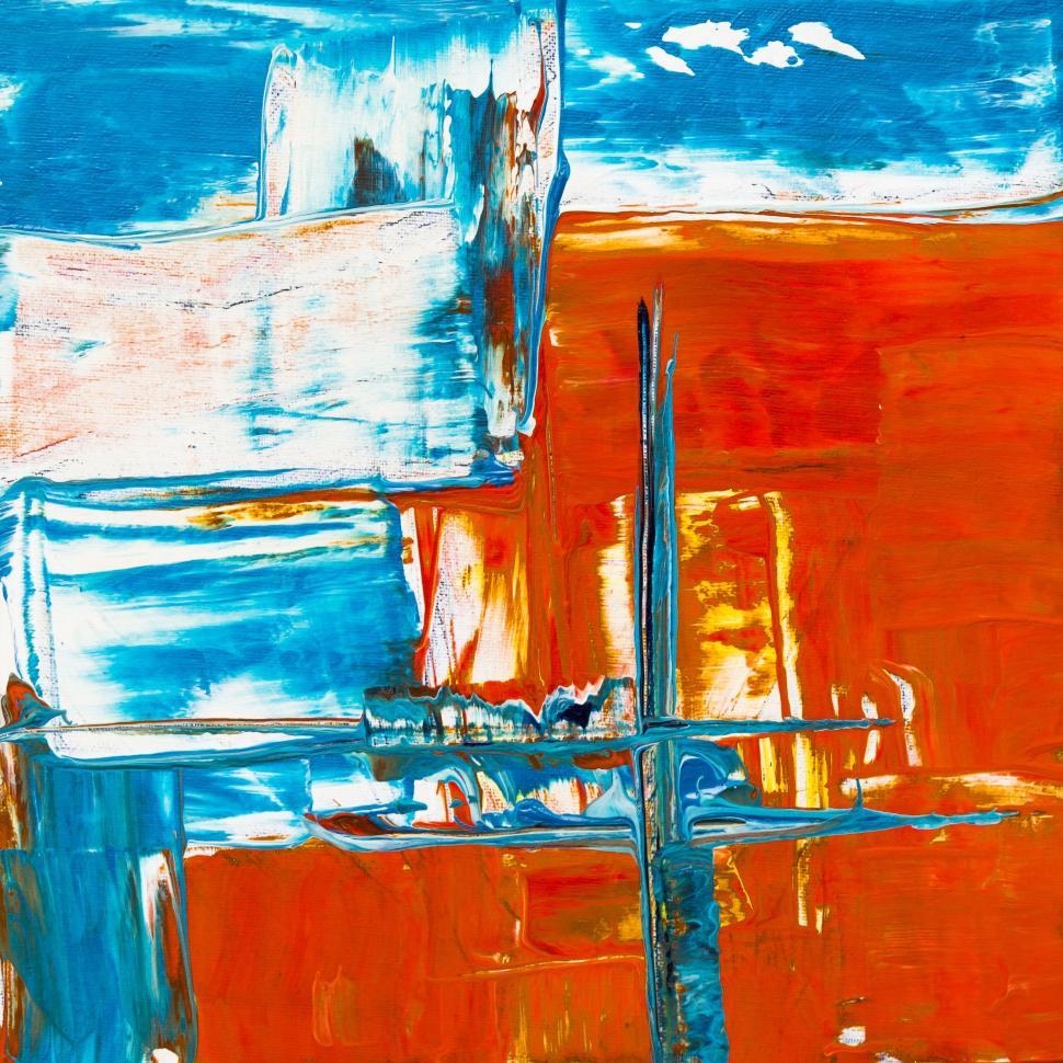 Free Image of Dynamic abstract painting with blue and orange hues. 