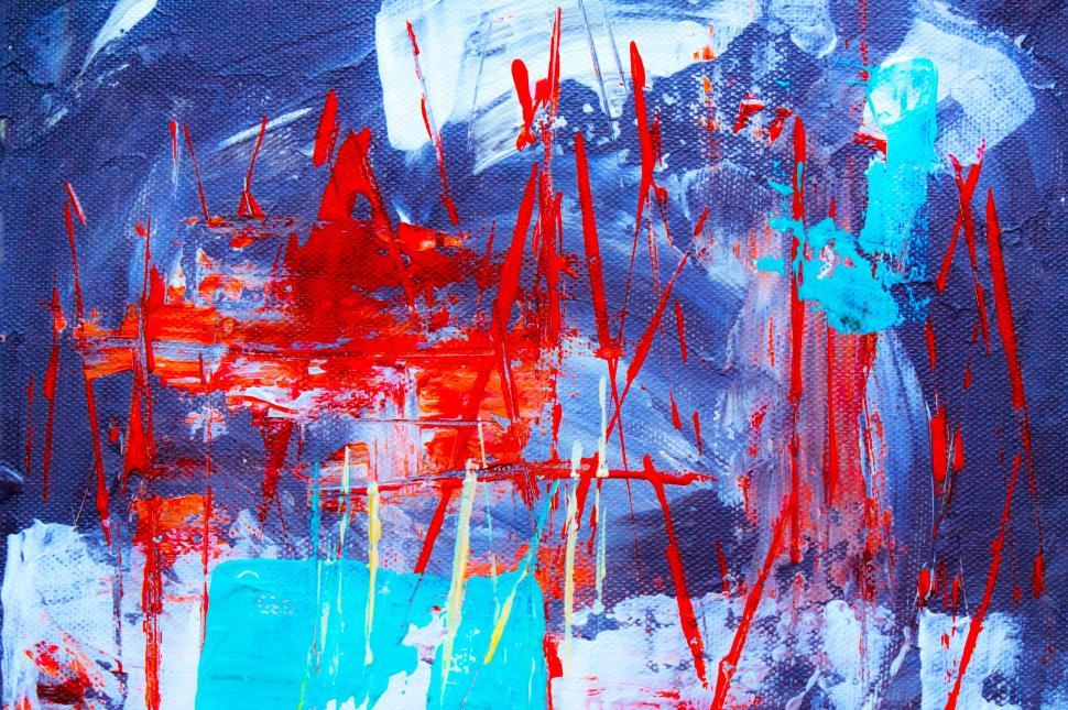 Free Image of Abstract painting with red splashes and blue accents. 