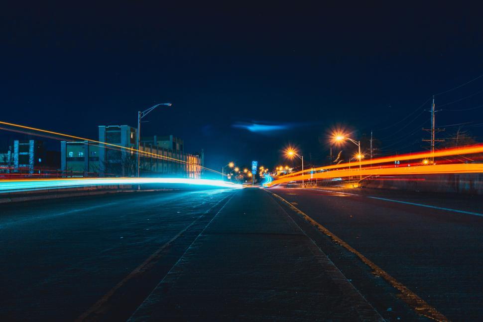 Free Image of Long exposure of light trails in a night city street 