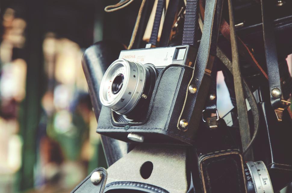 Free Image of Vintage camera with leather accessories in focus 